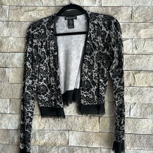 Shrug with sheer fringe